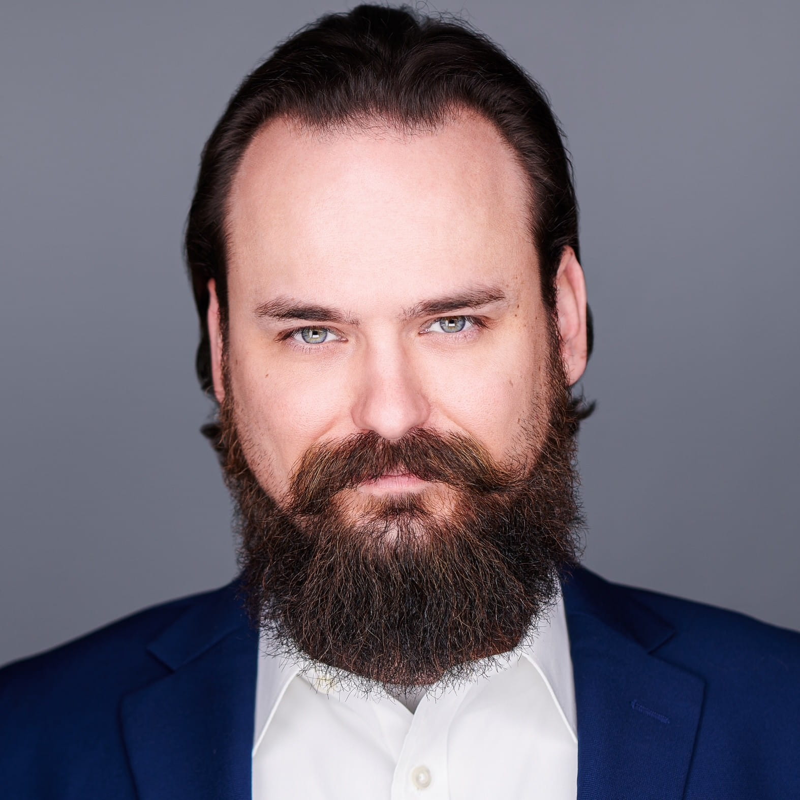 Headshot of team member Neil.